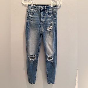 American Eagle Women’s Ladies Blue Jeans with rips Size 0